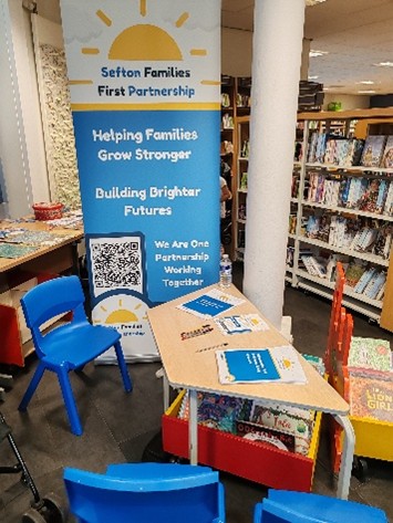 A families first banner in a library
