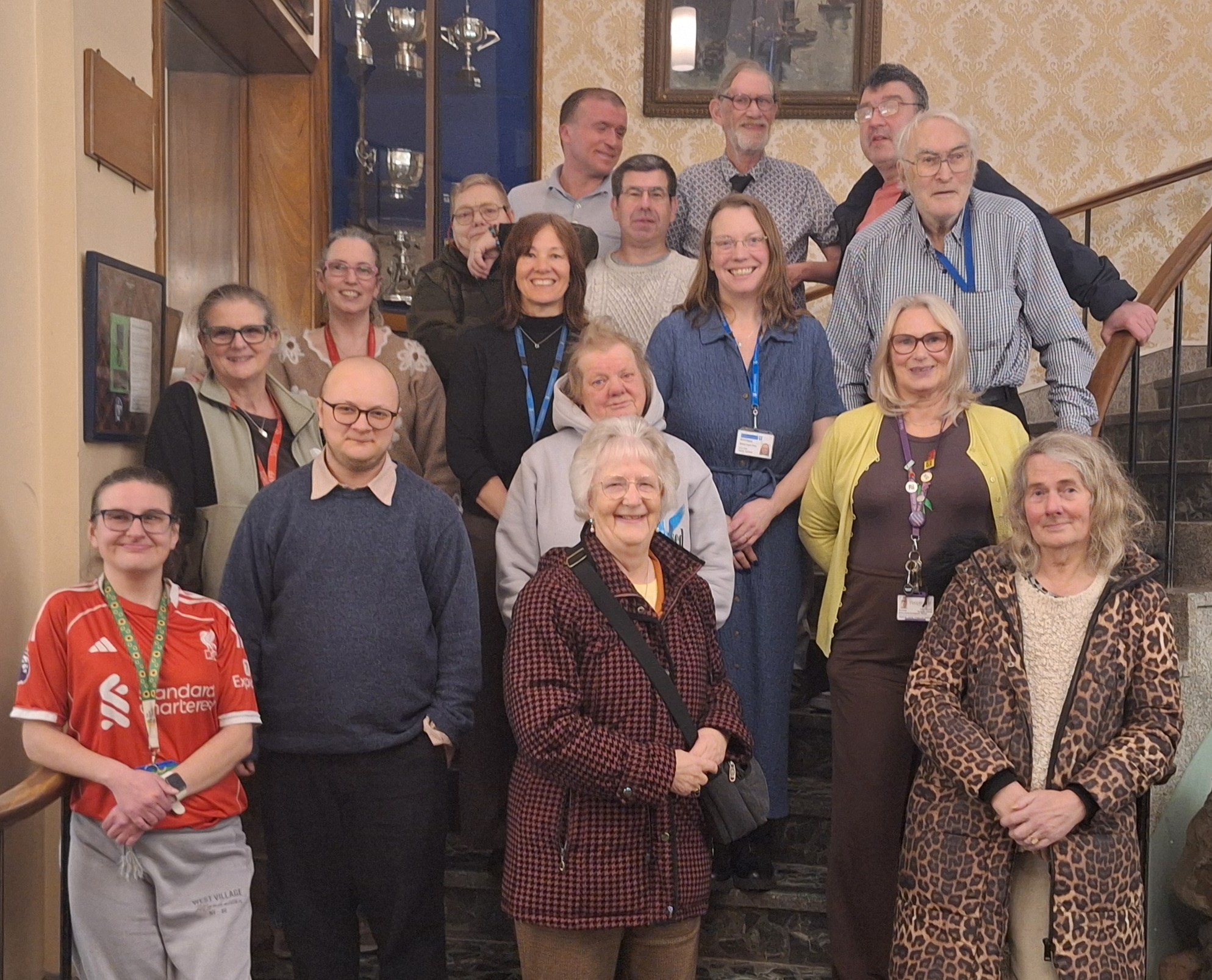 A group of people standing on stairs