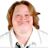 A White woman smiling
